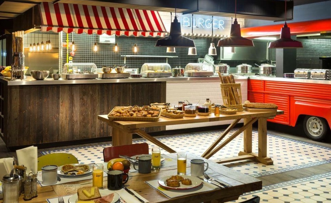 Reclaimed oak hospitality buffet and dining table in restaurant interior
