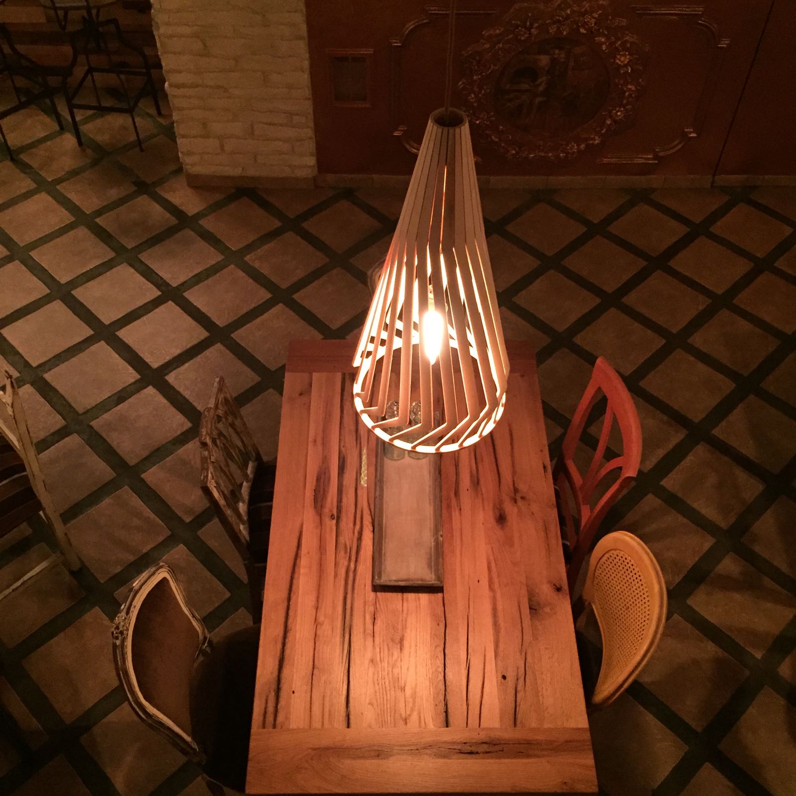 Top-view reclaimed oak communal dining table with authentic aged grain