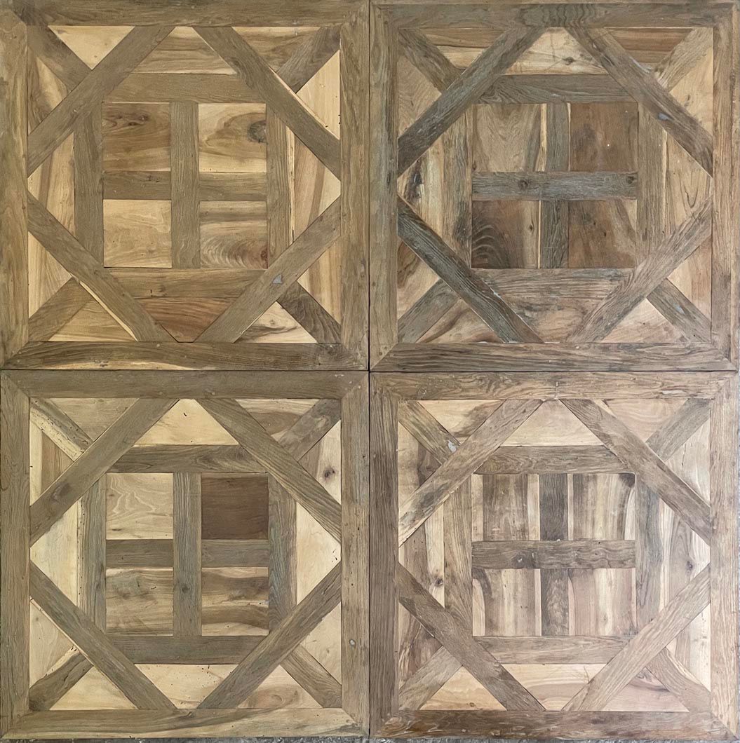 Versailles oak parquet panels being assembled in press jig, production workshop